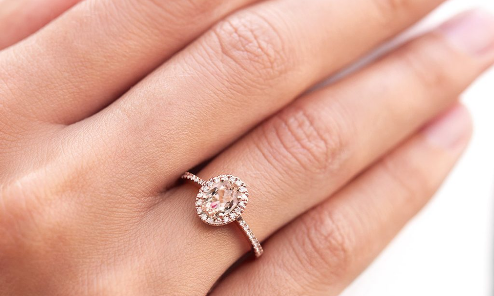 Morganite diamond ring in finger